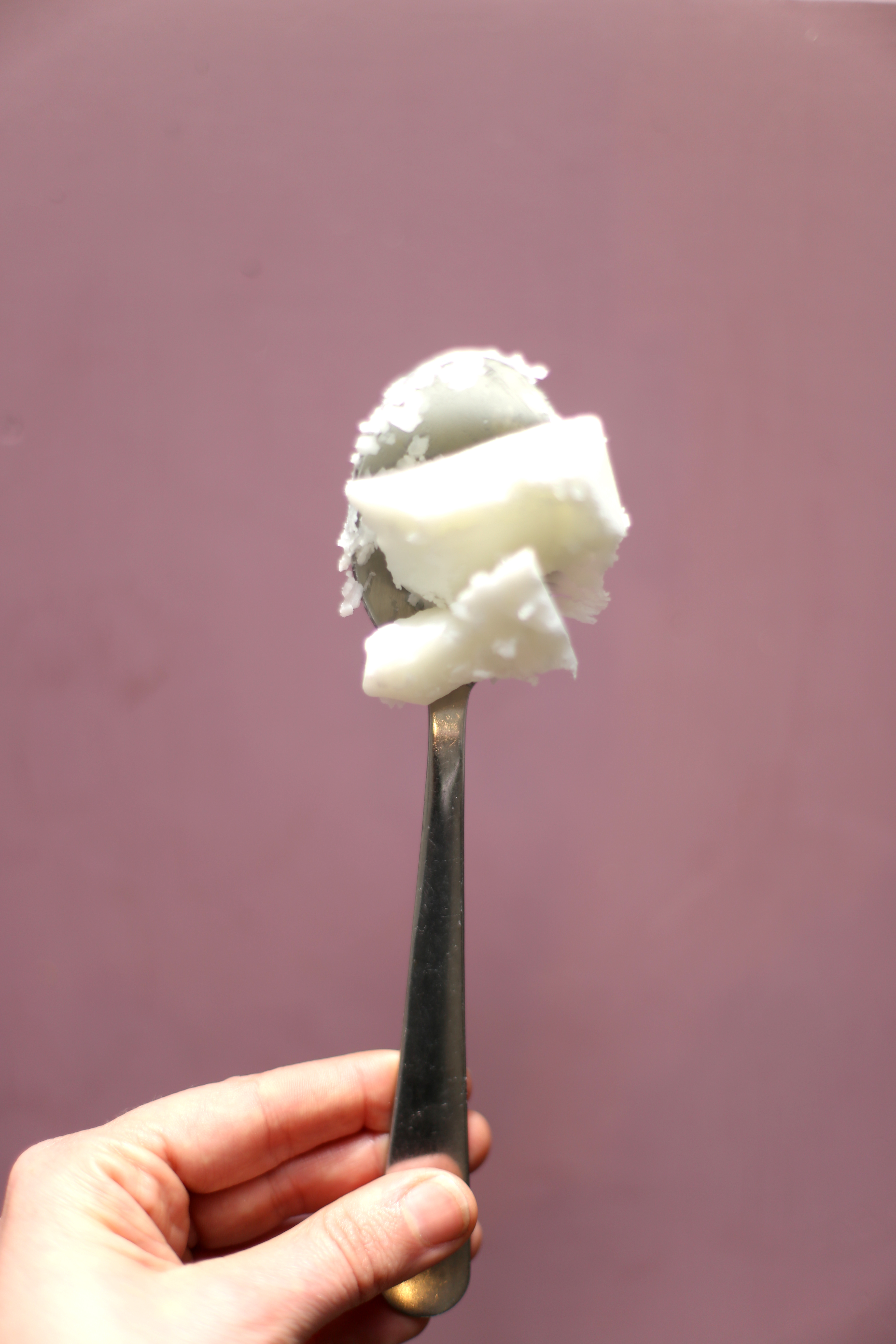 Een lepel met kokosvet